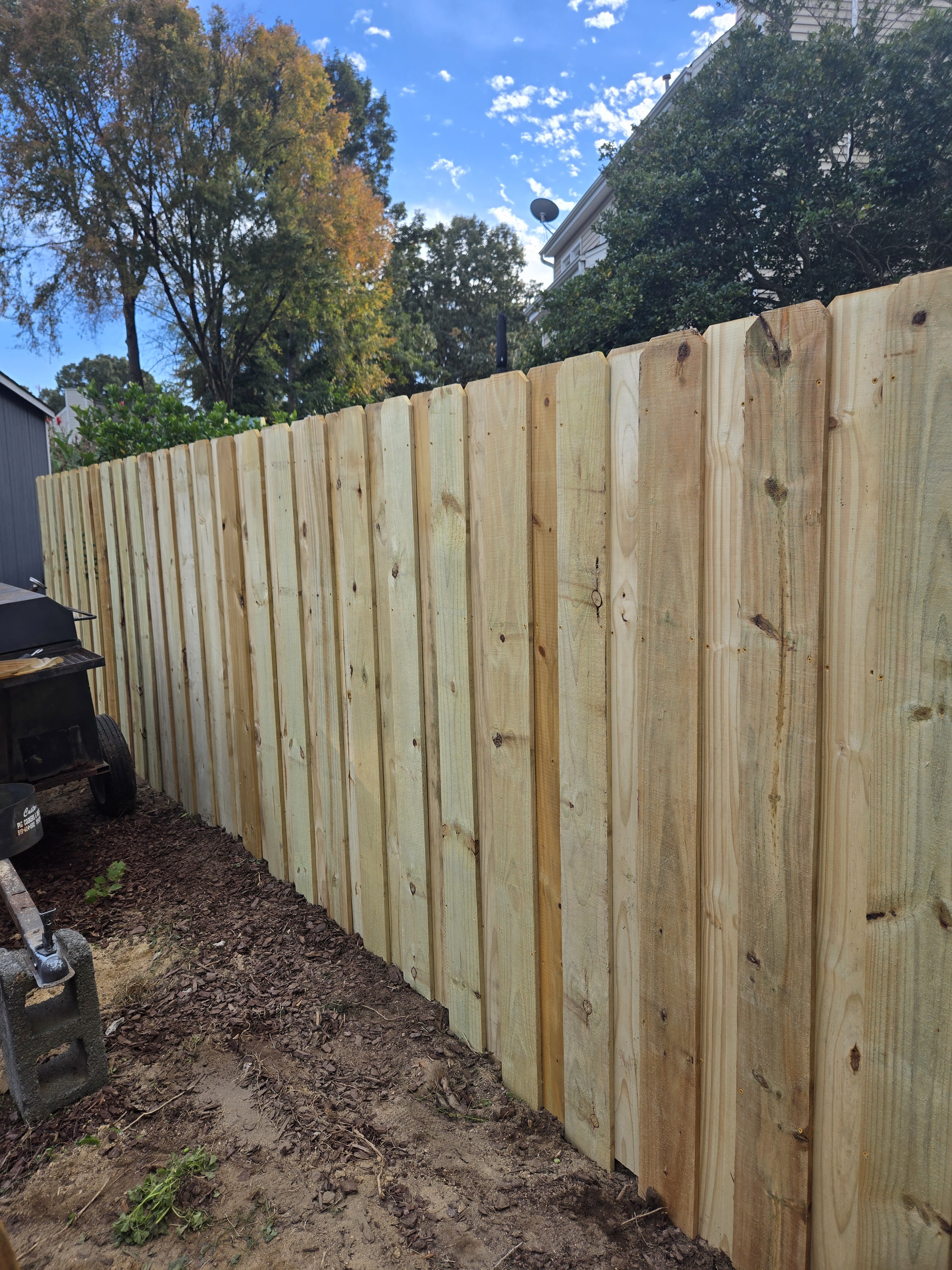 Finished wooden privacy fence