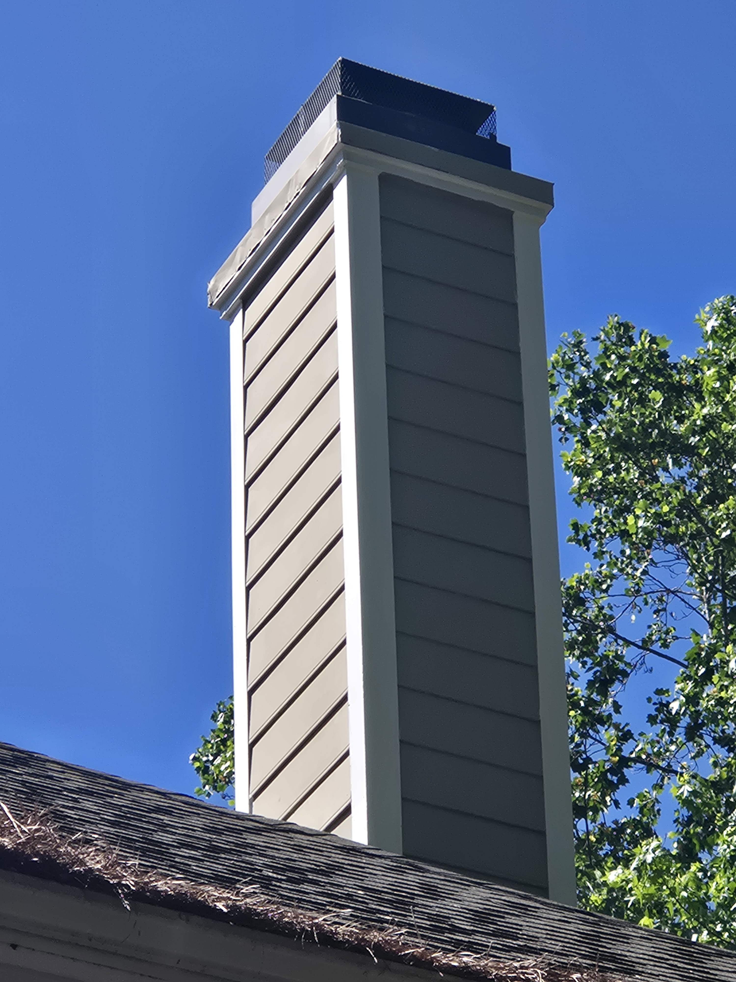 Dark gray siding corner installation